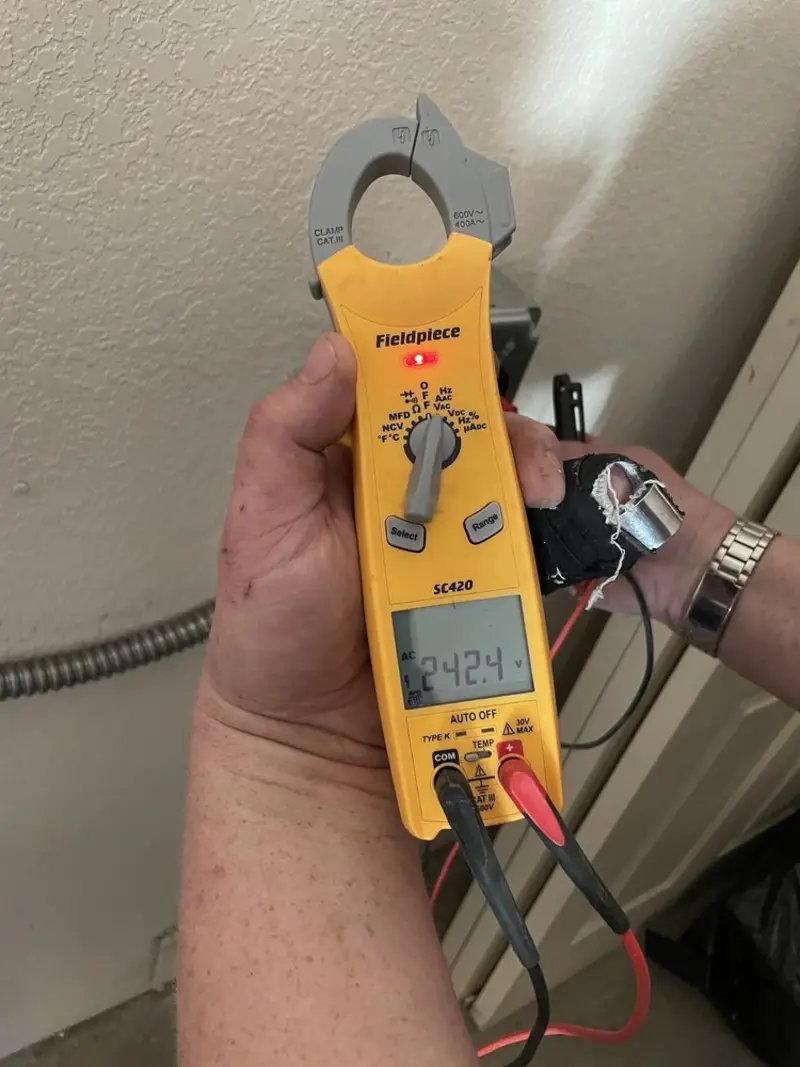 Voltage testing with clamp meter during Generator Installation in Bel Air